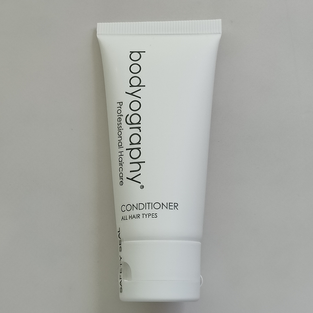 FREE WITH ANY PURCHASE NEW BODYOGRAPHY PROFESSIONAL CONDITIONER TRAVEL SIZE
